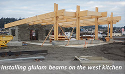 Installing glulam beams on the west kitchen