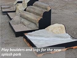 Play boulders and logs for the new splash park