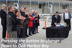 Pressing the button to change flows to Oak Harbor Bay