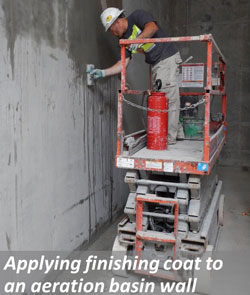 Applying finshing coat to an aeration basin wall