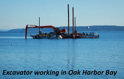 Excavator working in Oak Harbor Bay